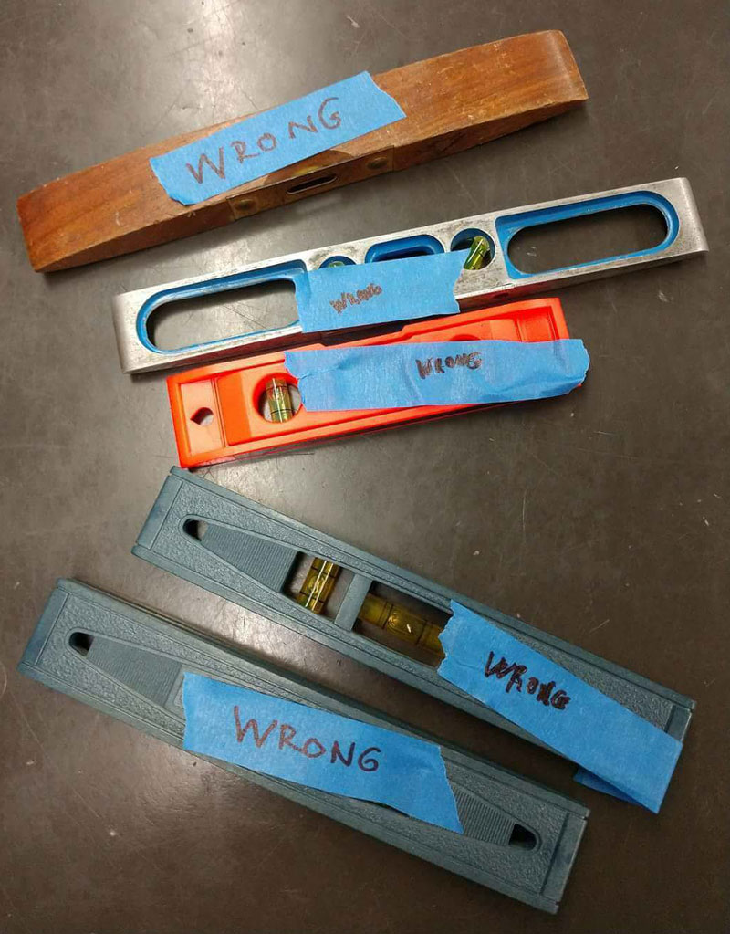 spirit leves with the word 'wrong' taped to them